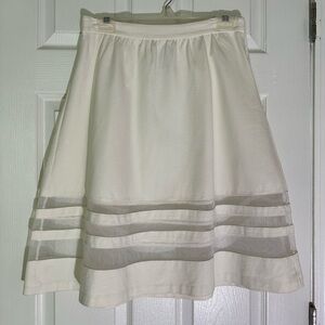 Cream skirt w/see through bottom